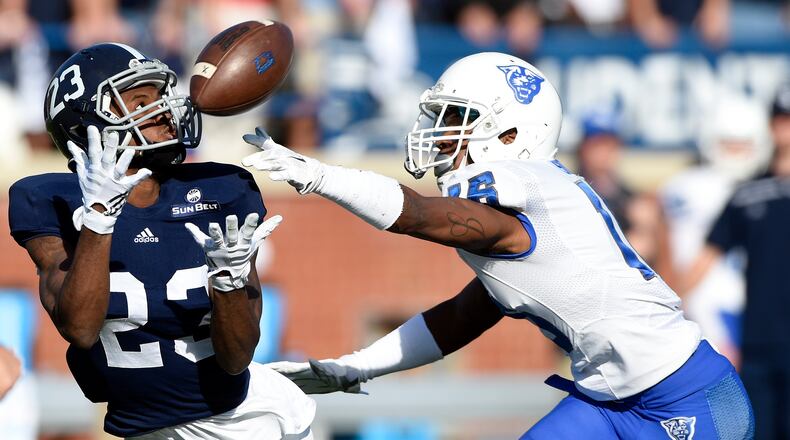 Wide receiver Derek Keaton #23 of the Georgia Southern Eagles can’t hold onto the ball as he’s covered by cornerback Jerome Smith #16 of the Georgia State Panthers during the first quarter on December 5, 2015 at Paulson Stadium in Statesboro, Georgia. (Photo by Todd Bennett/Getty Images)