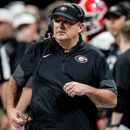 Georgia head coach Kirby Smart walks the sidelines during the second half of a Southeastern Conference championship NCAA college football game against Alabama, Saturday, Dec. 6, 2025, in Atlanta. (AP Photo/Mike Stewart)