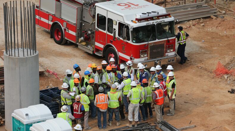 A man is being treated for a “severe head injury” after metal scaffolding fell on him at the construction site for the new Atlanta Falcons stadium, officials said.