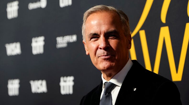 Canada Prime Minister Mark Carney arrives at the Toronto International Film Festival Tribute Awards gala in Toronto, Sunday, Sept. 13, 2026. (Chris Young/The Canadian Press via AP)