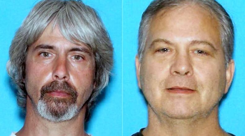 These undated booking photos provided by the Snohomish County Sheriff Office shows Tony Reed, left, and John Reed.