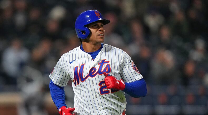 New York Mets' Juan Soto reacts after hitting a line out during the third inning of a baseball game against the Minnesota Twins Wednesday, April 22, 2026, in New York. (AP Photo/Frank Franklin II)