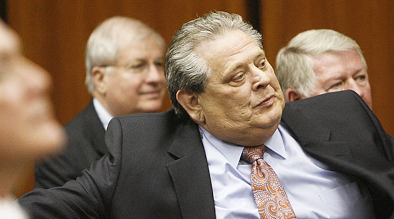January 2009 -- Dwight Brown, in salmon-colored tie, remains in court after hearing he won't have to testify. The judge said he could leave. Cobb EMC court hearing in Cobb County Superior Court. Cobb EMC head Dwight Brown was subpoenaed, but Senior Judge Michael Stoddard ruled he didn't have to testify. Story is on latest court fight between Cobb EMC and members who sued it. Judge will decide whether the co-op's board illegally changed the rules in order to thwart a potential co-op member revolt.