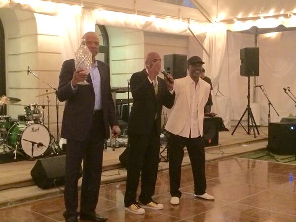 Dr. J hoists the coveted "Kenny Cup!" Photo: Jennifer Brett