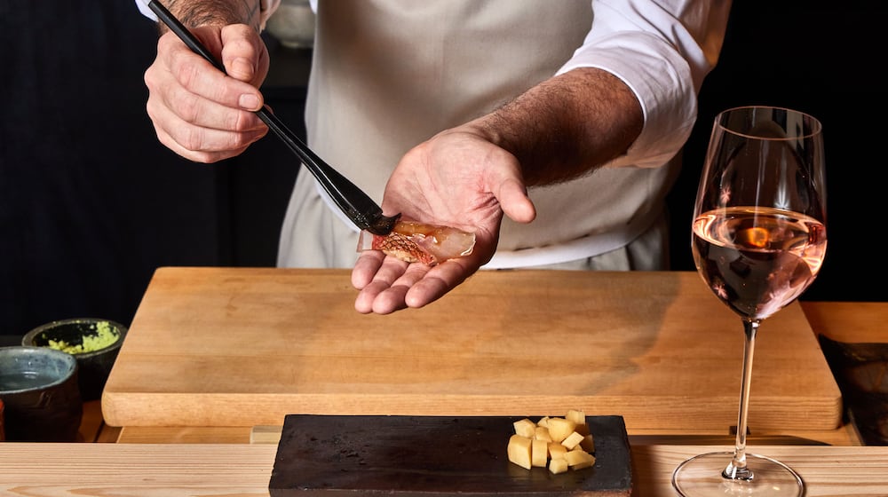 250820 Atlanta, Ga: Chef J. Trent Harris making sushi. Photo for Dining Guide 2025. Styling by J. Trent Harris and Bailey Garrot. Photo taken Wednesday August 20, 2025 at Mujo. AAJC 092825 DG Atlanta 50 (BAILEY GARROT FOR THE ATLANTA JOURNAL-CONSTITUTION)