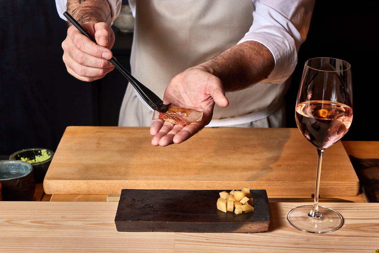 250820 Atlanta, Ga: Chef J. Trent Harris making sushi. Photo for Dining Guide 2025. Styling by J. Trent Harris and Bailey Garrot. Photo taken Wednesday August 20, 2025 at Mujo. AAJC 092825 DG Atlanta 50 (BAILEY GARROT FOR THE ATLANTA JOURNAL-CONSTITUTION)