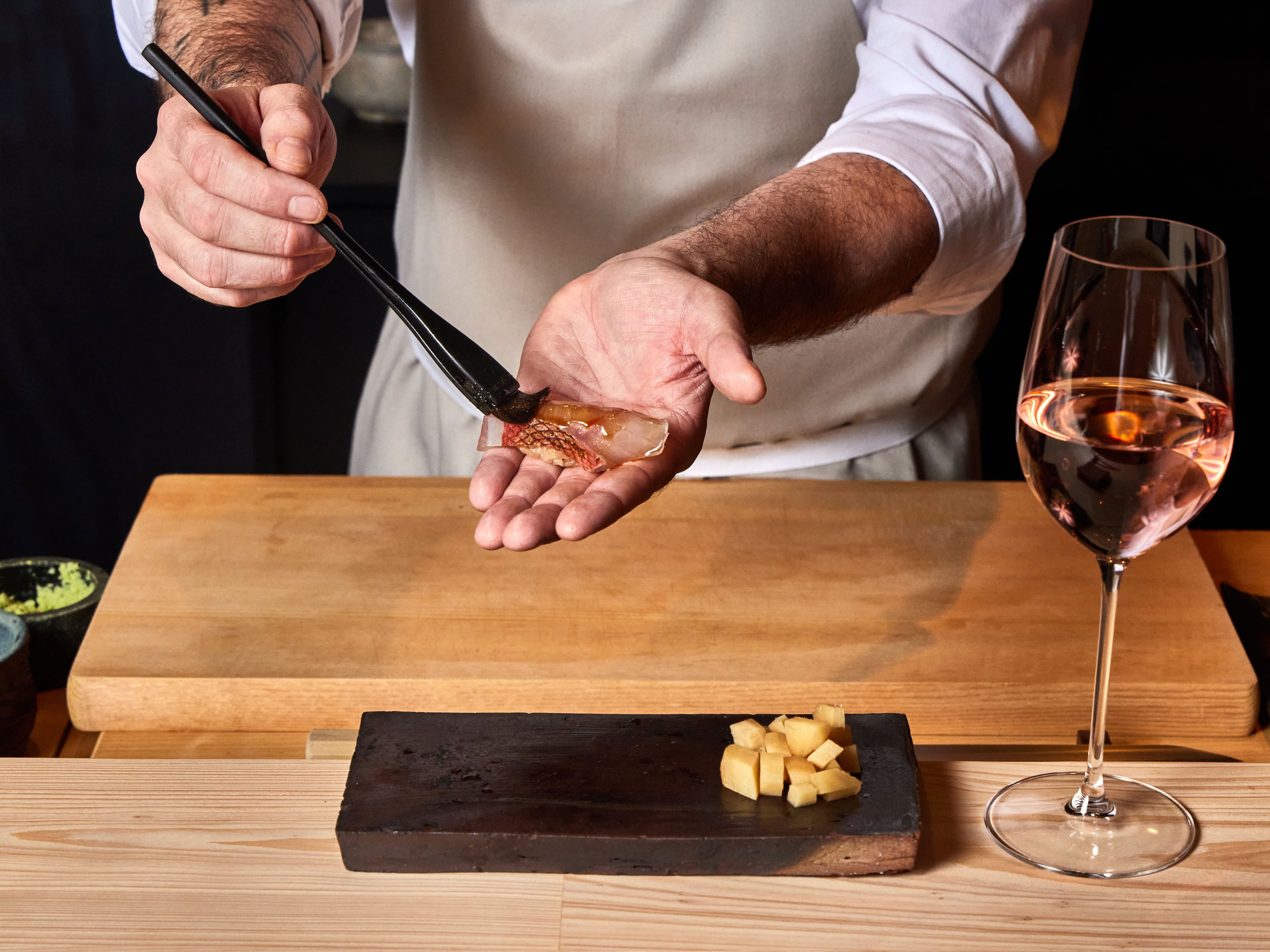 250820 Atlanta, Ga: Chef J. Trent Harris making sushi. Photo for Dining Guide 2025. Styling by J. Trent Harris and Bailey Garrot. Photo taken Wednesday August 20, 2025 at Mujo. AAJC 092825 DG Atlanta 50 (BAILEY GARROT FOR THE ATLANTA JOURNAL-CONSTITUTION)