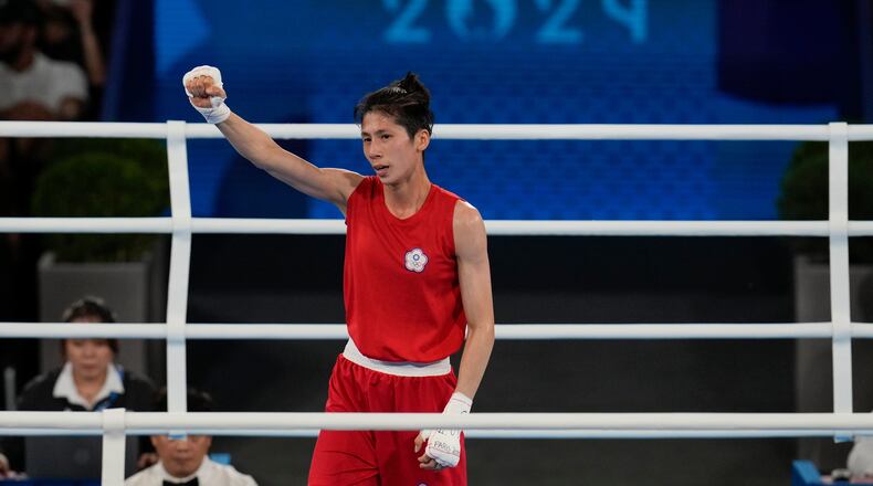 FILE - Taiwan's Lin Yu-ting celebrates after defeating Poland's Julia Szeremeta in their women's 57 kg final boxing match at the 2024 Summer Olympics, Saturday, Aug. 10, 2024, in Paris, France. (AP Photo/Ariana Cubillos, File)