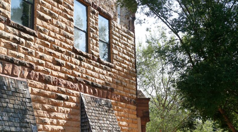 Sandstone bricks from the side of the historic Pawnee County Bank litter the sidewalk after an early morning earthquake in Pawnee, Oka., on Saturday, Sept. 3, 2016. The United States Geological Survey said a 5.6 magnitude earthquake happened Saturday morning in north-central Oklahoma, on the fringe of an area where regulators had stepped in to limit wastewater disposal. That temblor matches a November 2011 quake in the same region. (Paul Hellstern/The Oklahoman via AP)