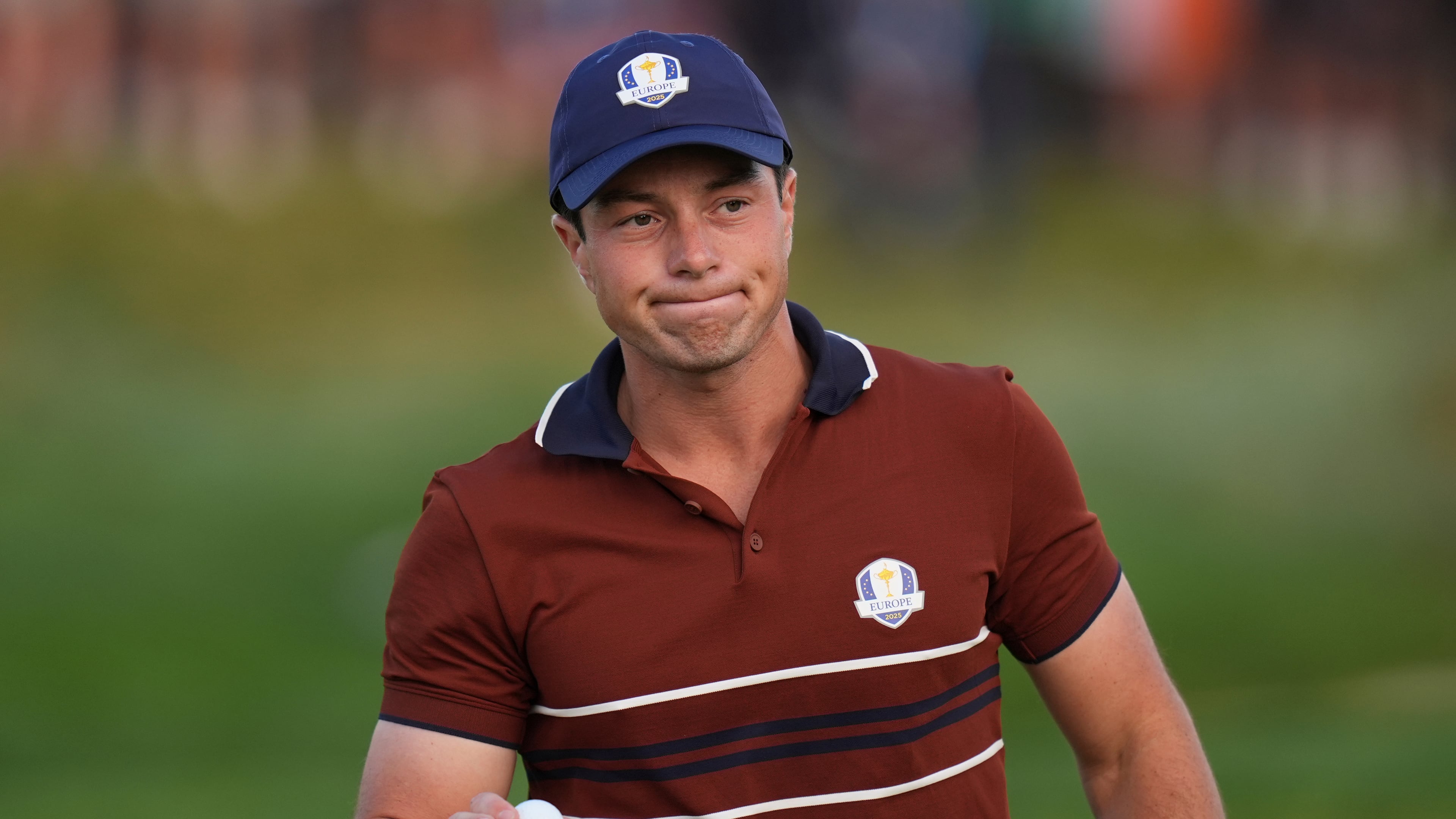 Europe's Viktor Hovland waves after making a putt on the second hole at Bethpage Black golf course during the Ryder Cup golf tournament, Saturday, Sept. 27, 2025, in Farmingdale, N.Y. (AP Photo/Seth Wenig)