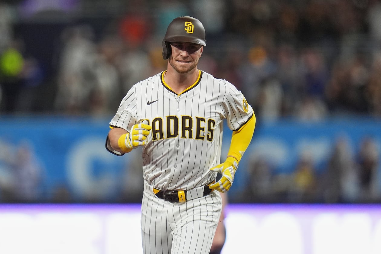 FILE - San Diego Padres' Ryan O'Hearn celebrates after hitting a grand slam during the first inning of a baseball game against the Milwaukee Brewers, Sept. 23, 2025, in San Diego. (AP Photo/Gregory Bull, File)