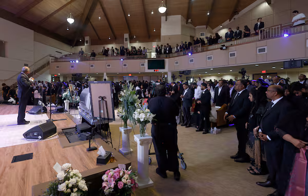 Dave Fiji's funeral on June 6, 2026, was attended by hundreds of family members and friends. He laid in a silver casket that was left open during the entire service. (Akili-Casundria Ramsess for the AJC)