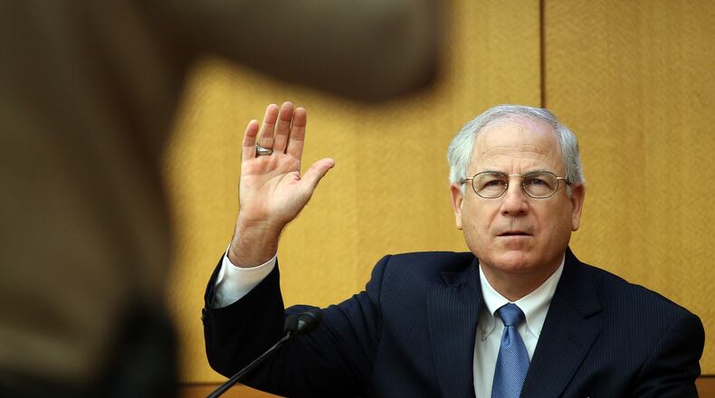 Bob Wilson, one of the people tasked by former Gov. Sonny Perdue to investigate CRCT cheating, is sworn in before testifying during the trial of APS supervisor Tamara Cotman on Tuesday afternoon August 27, 2013.