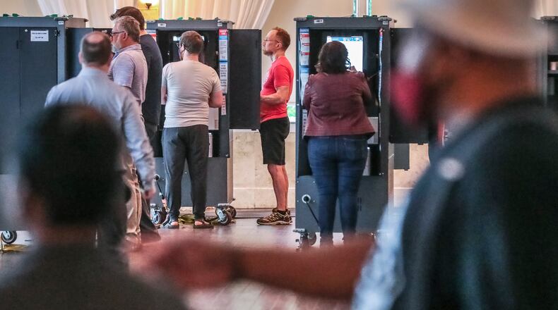 Voters cast their ballots at Park Tavern in Northeast Atlanta on Monday, May 23, 2022 (John Spink / John.Spink@ajc.com)