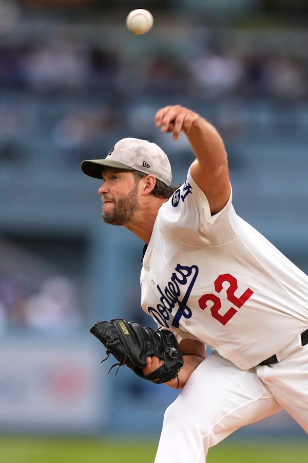 Los Angeles Dodgers starting pitcher Clayton Kershaw throws to the plate during the first inning of a baseball game against the Los Angeles Angels, Saturday, May 17, 2025, in Los Angeles. (AP Photo/Mark J. Terrill)