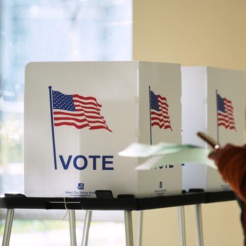 FILE - A person waits to cast a ballot at the Horatio Williams Foundation in downtown Detroit, Nov. 4, 2025. (AP Photo/Ryan Sun, File)