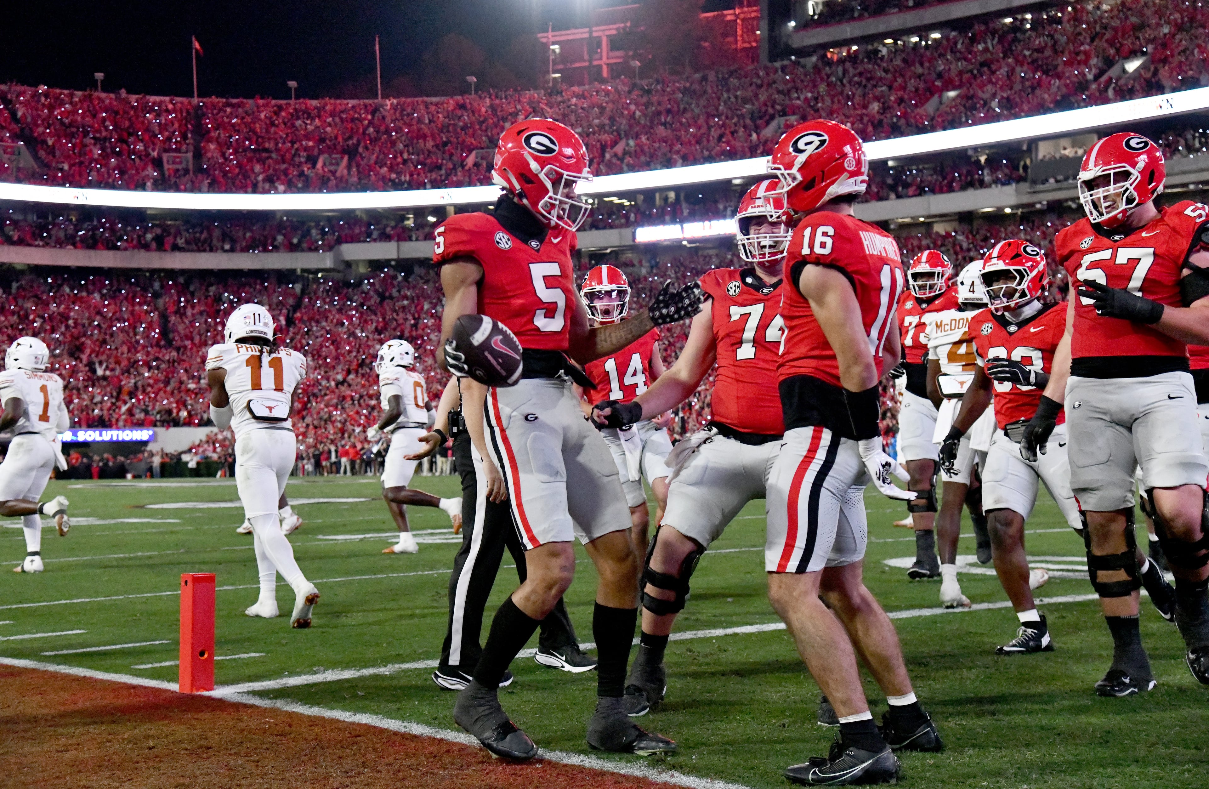 Georgia wide receiver Noah Thomas (5) celebrates after scoring a touchdown during the first half in an NCAA football game at Sanford Stadium, Saturday, November 15, 2025, in Athens. (Hyosub Shin / AJC)