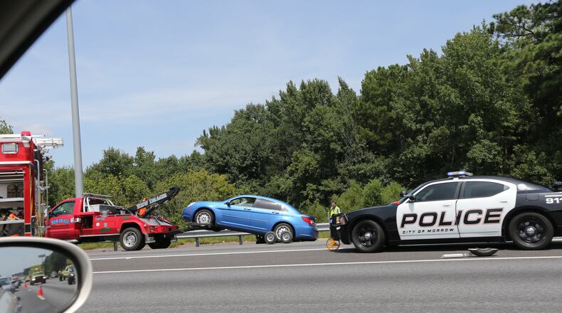 A woman was killed and her brother died of injuries Monday after being hit by a car entering northbound I-75 in Morrow, police said.