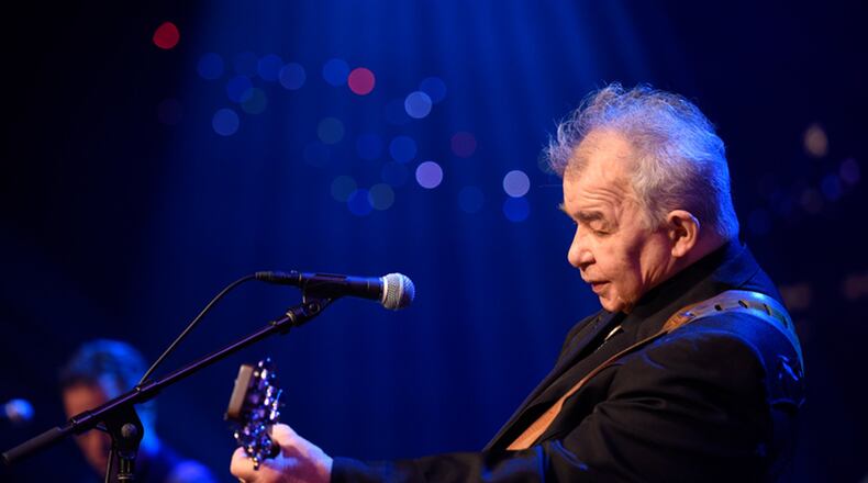 John Prine is still hospitalized with coronavirus.