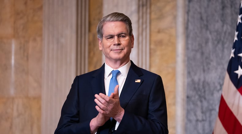 Treasury Secretary Scott Bessent applauds during an event about Trump Accounts for children in foster care at the Department of Treasury, Thursday, June 11, 2026, in Washington. (AP Photo/Allison Robbert)