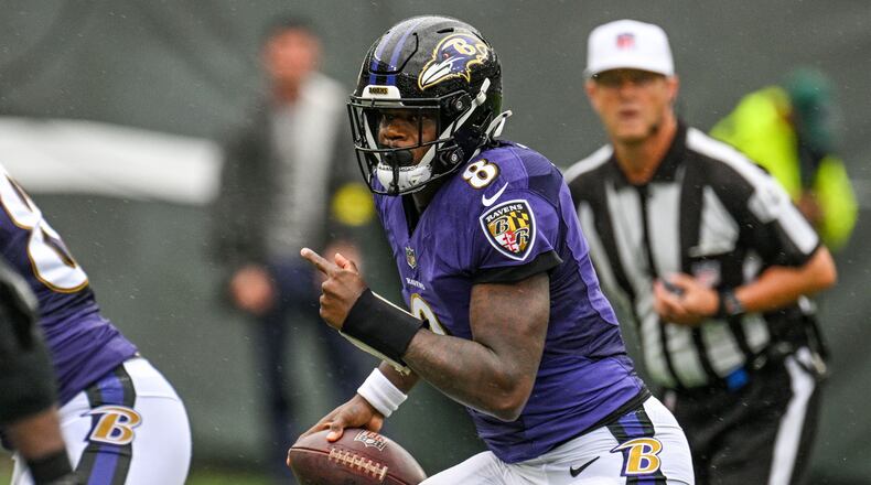 Quarterback Lamar Jackson is free to sign with other teams, but he still could return to the Ravens. (Jerry Jackson file photo/The Baltimore Sun/TNS)