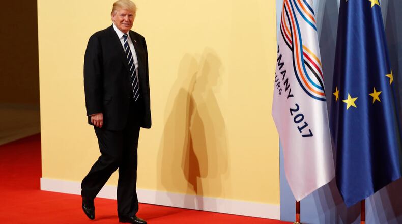 President Donald Trump arrives for the opening day of the G20 summit on Friday in Hamburg, Germany.