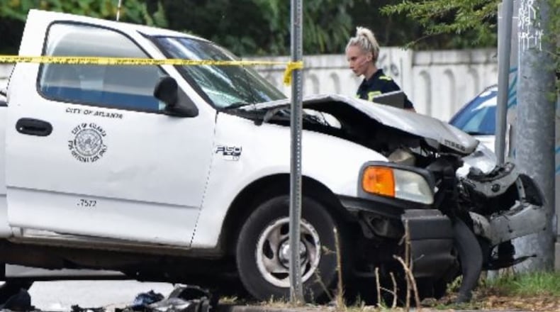 Officers saved the life of a carjacking suspect Wednesday after shooting him in the shoulder, leg and forearm. HYOSUB SHIN / HSHIN@AJC.COM