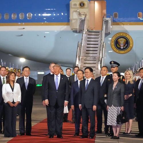 President Donald Trump arrives on Air Force One, Wednesday, May 13, 2026, at Beijing Capital International Airport in Beijing. (AP Photo/Mark Schiefelbein)