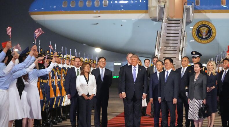 President Donald Trump arrives on Air Force One, Wednesday, May 13, 2026, at Beijing Capital International Airport in Beijing. (AP Photo/Mark Schiefelbein)