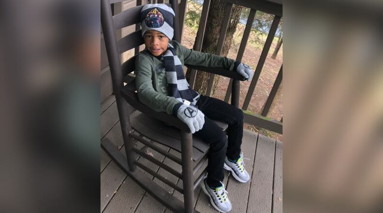 D’Mari Johnson, 11, is fighting for his life after he was shot at the Golden Glide skating rink in DeKalb County on April 9. (Credit: The Cochran Firm)