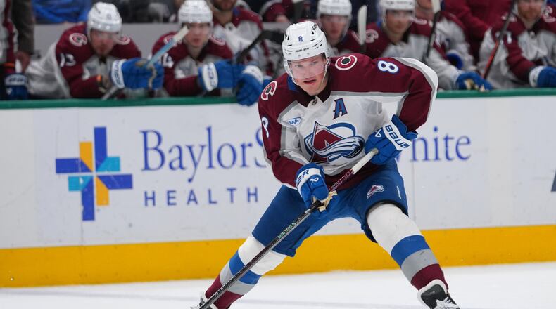 FILE - Colorado Avalanche defenseman Cale Makar skates with the puck during the second period of an NHL hockey game against the Dallas Stars, March 6, 2026, in Dallas. (AP Photo/Julio Cortez, File)