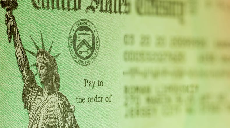 The loose consensus of economists and many Washington lawmakers contacted by McClatchy is to keep giving the millions of people out of work that extra $600 a week, or at least some emergency payment, as unemployment benefits. (Dreamstime/TNS)