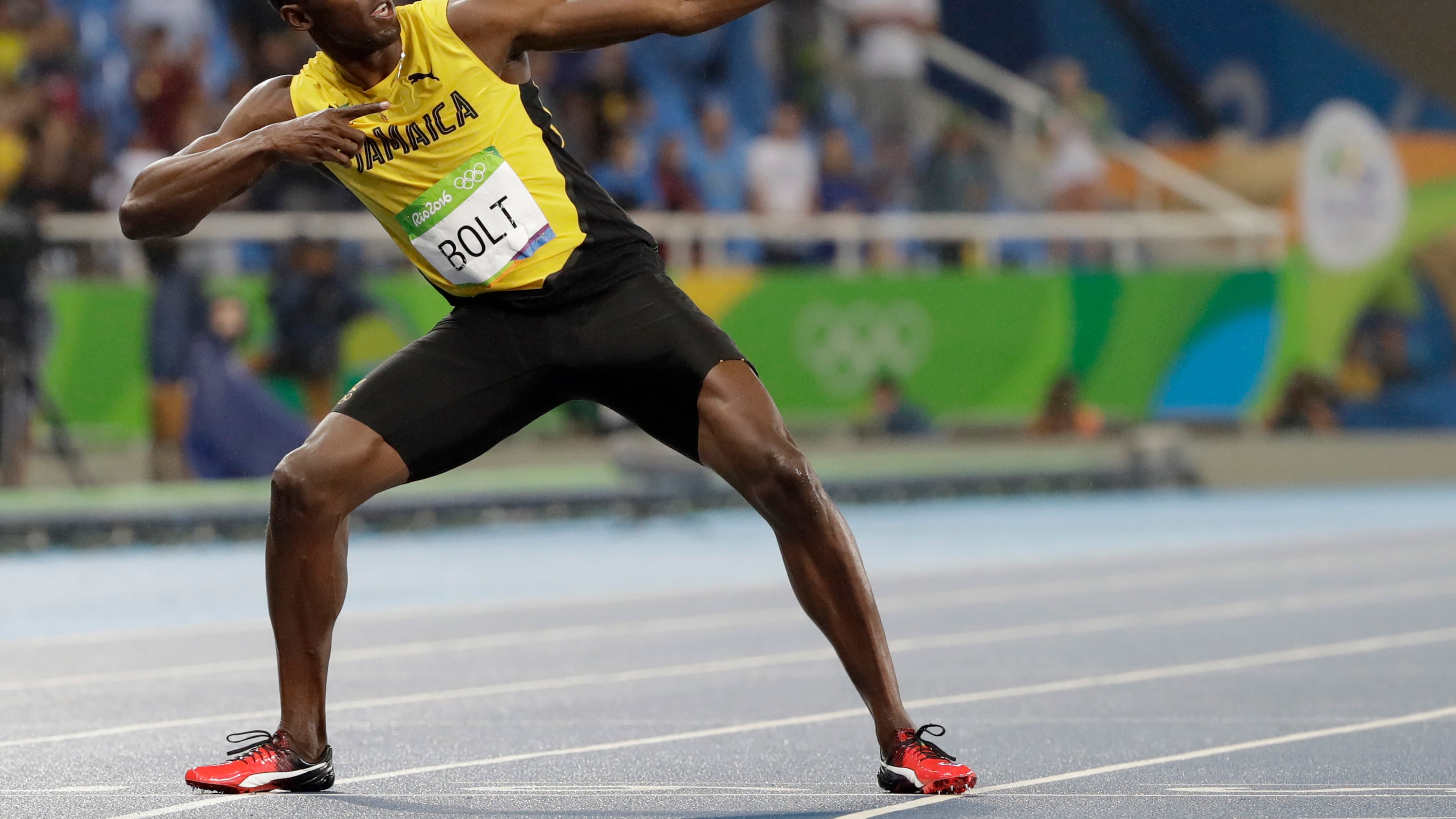 FILE - Usain Bolt from Jamaica celebrates winning the gold medal in the men's 200-meter final during the athletics competitions of the 2016 Summer Olympics at the Olympic stadium in Rio de Janeiro, Brazil, Thursday, Aug. 18, 2016. (AP Photo/David J. Phillip, File)