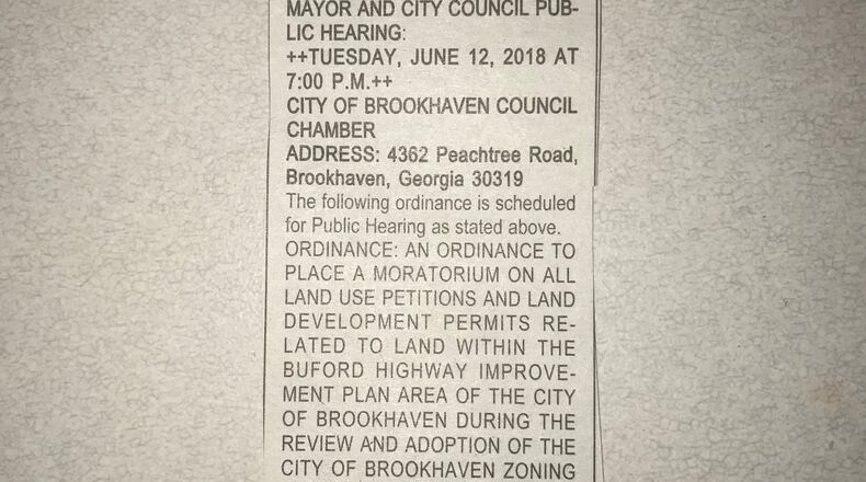 In this legal notice, the City of Brookhaven publicizes a public hearing that could precede a vote to impose a moratorium on new developments along Buford Highway.