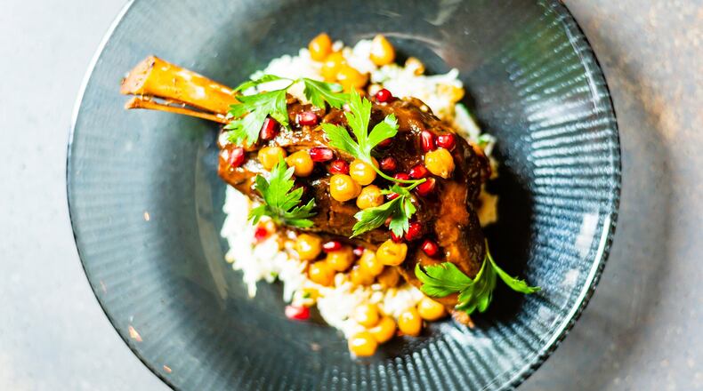 The braised lamb shank makes for a fine entree at Aziza. CONTRIBUTED BY HENRI HOLLIS