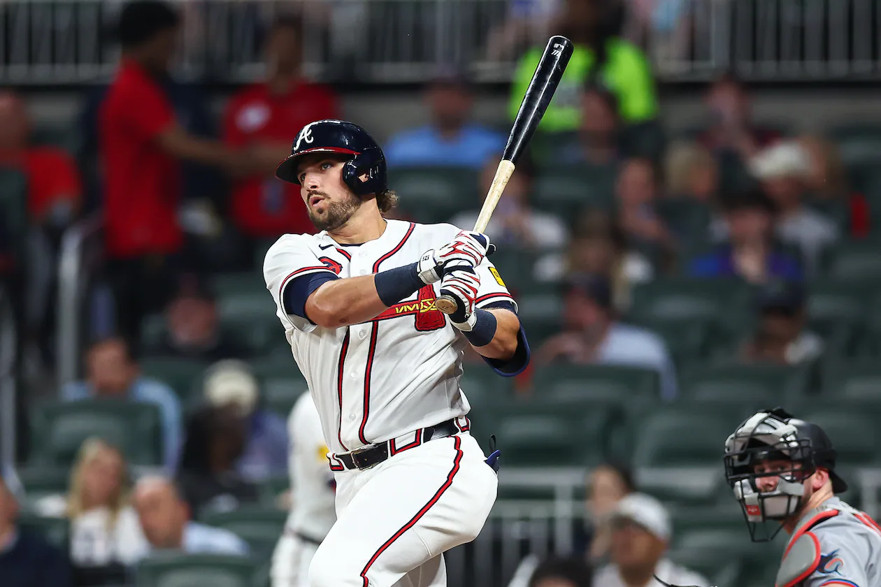 Braves third baseman Austin Riley hits an RBI single during the fourth inning against the Marlins on Monday, April 13, 2026, in Atlanta. (Colin Hubbard/AP)