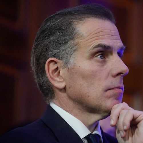 FILE - Hunter Biden listens while his father, President Joe Biden, speaks during a Hanukkah reception in the East Room of the White House in Washington, Dec. 16, 2024. (AP Photo/Rod Lamkey, Jr., File)