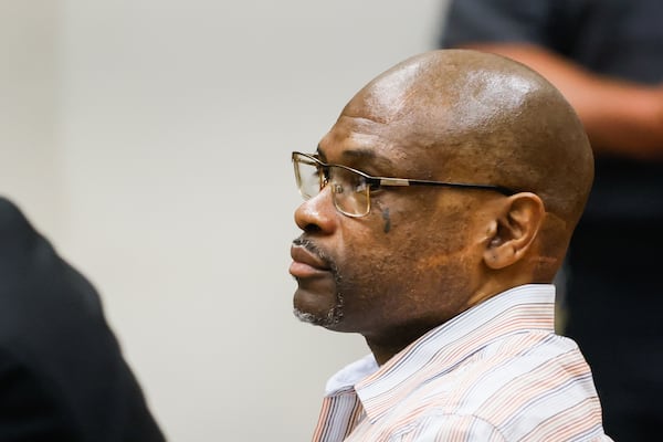 Edrick Lamont Faust listens to the judge in Athens on Thursday, August 21, 2025. Faust, charged with murder in the 2001 killing of UGA law student Tara Baker, was attending a status conference hearing ahead of his trial. (Abbey Cutrer / AJC)