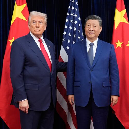 FILE - President Donald Trump, left, and Chinese President Xi Jinping pose ahead of their summit talk at Gimhae International Airport in Busan, South Korea, Oct. 30, 2025. (AP Photo/Mark Schiefelbein, File