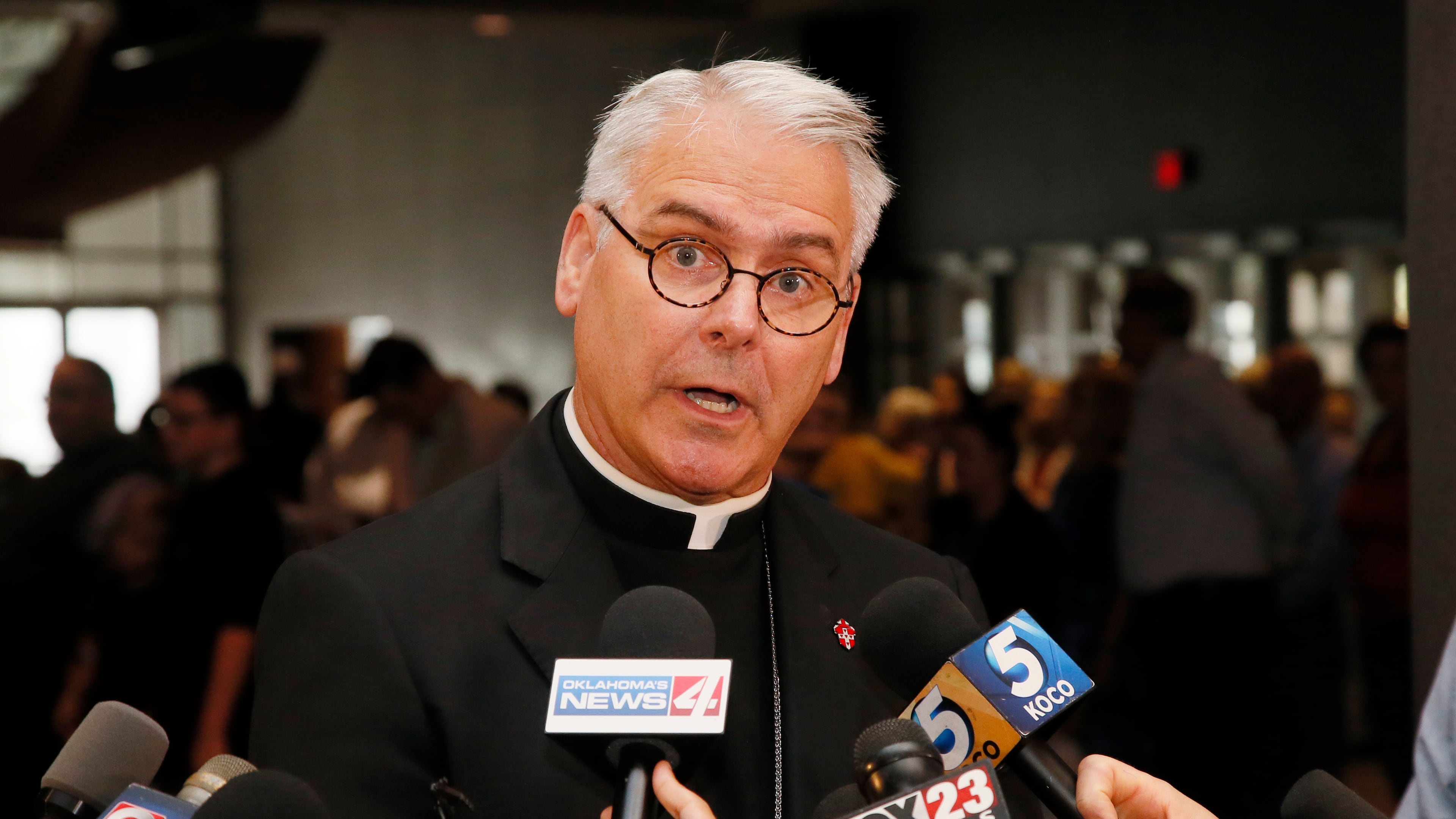 FILE - Archbishop Paul Coakley speaks to the media before the Beatification Ceremony for Stanley Rother in Oklahoma City, Sept. 23, 2017. (AP Photo/Sue Ogrocki, File)