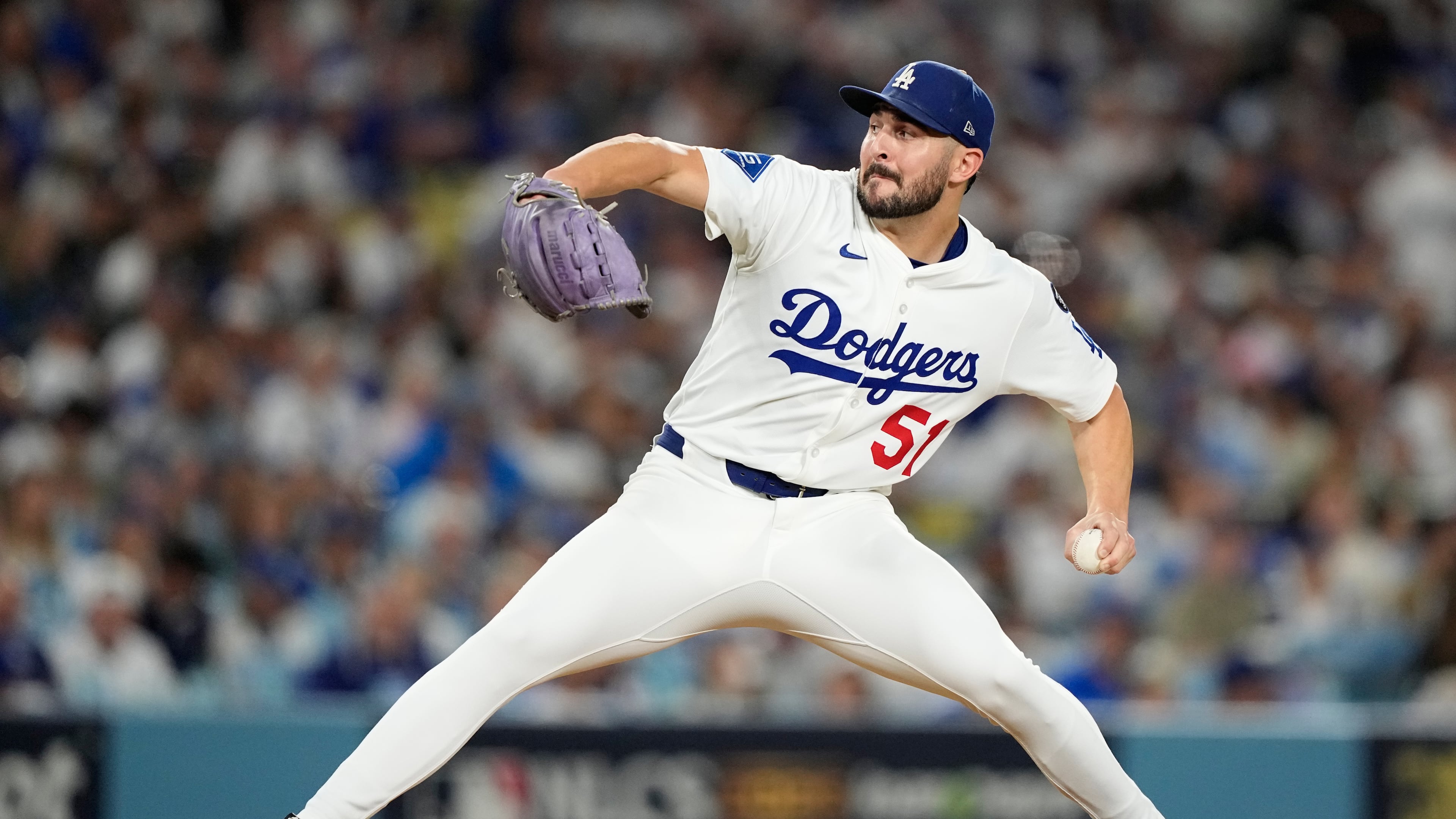 Los Angeles Dodgers pitcher Alex Vesia throws against the Milwaukee Brewers during the seventh inning in Game 4 of baseball's National League Championship Series, Friday, Oct. 17, 2025, in Los Angeles. (AP Photo/Brynn Anderson)
