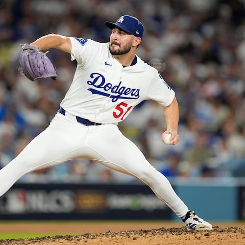 Los Angeles Dodgers pitcher Alex Vesia throws against the Milwaukee Brewers during the seventh inning in Game 4 of baseball's National League Championship Series, Friday, Oct. 17, 2025, in Los Angeles. (AP Photo/Brynn Anderson)