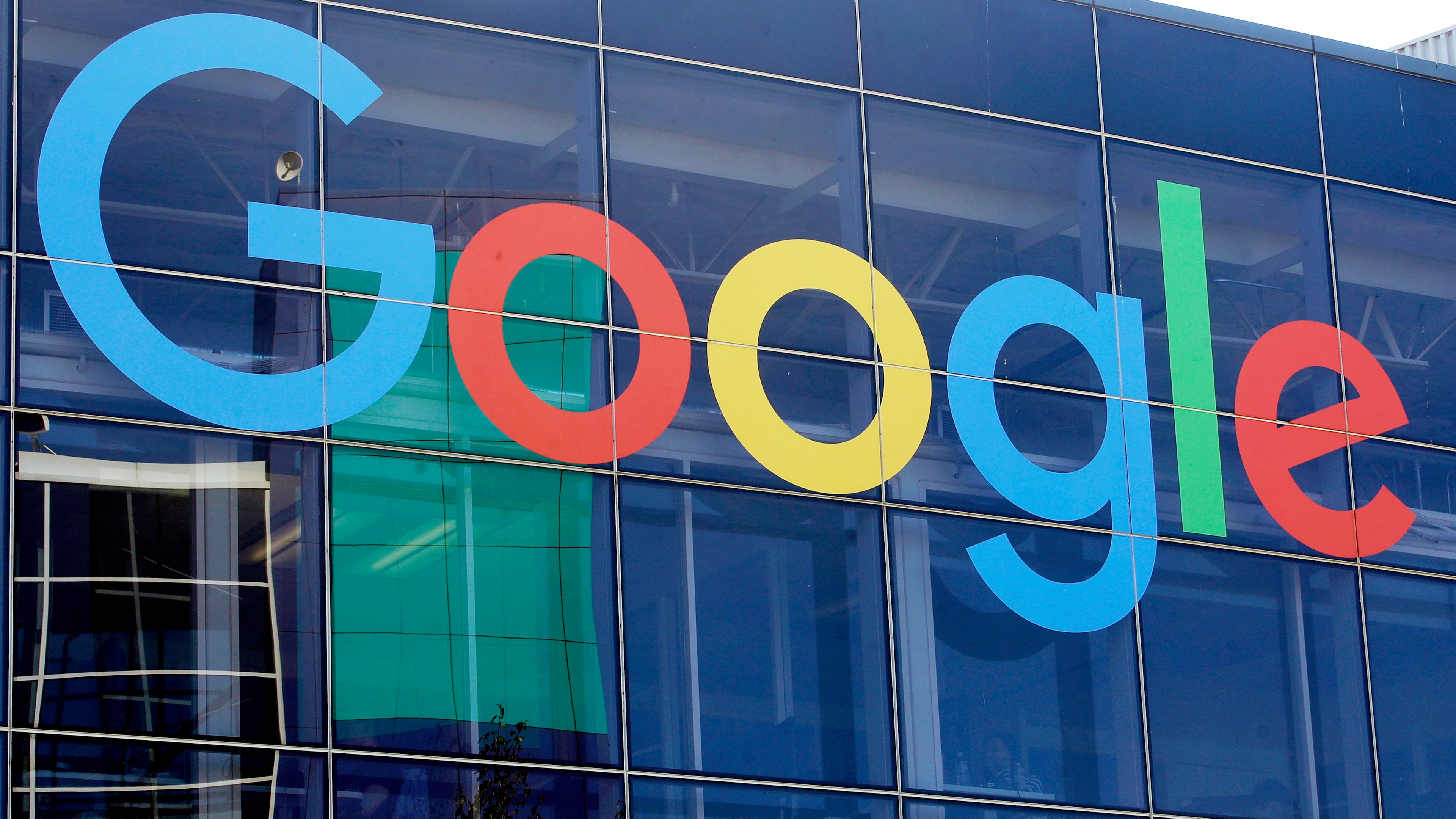 FILE - A sign is displayed on a Google building at their campus in Mountain View, Calif., Sept. 24, 2019. (AP Photo/Jeff Chiu, File)