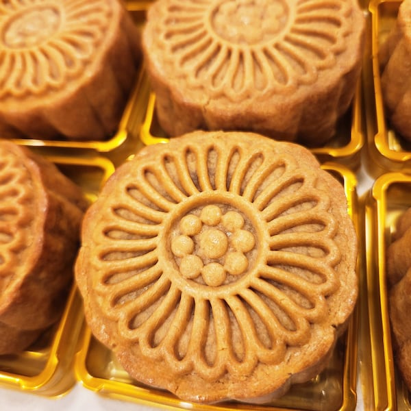 Close-up of a mooncake from Love It Gluten Free Bakery