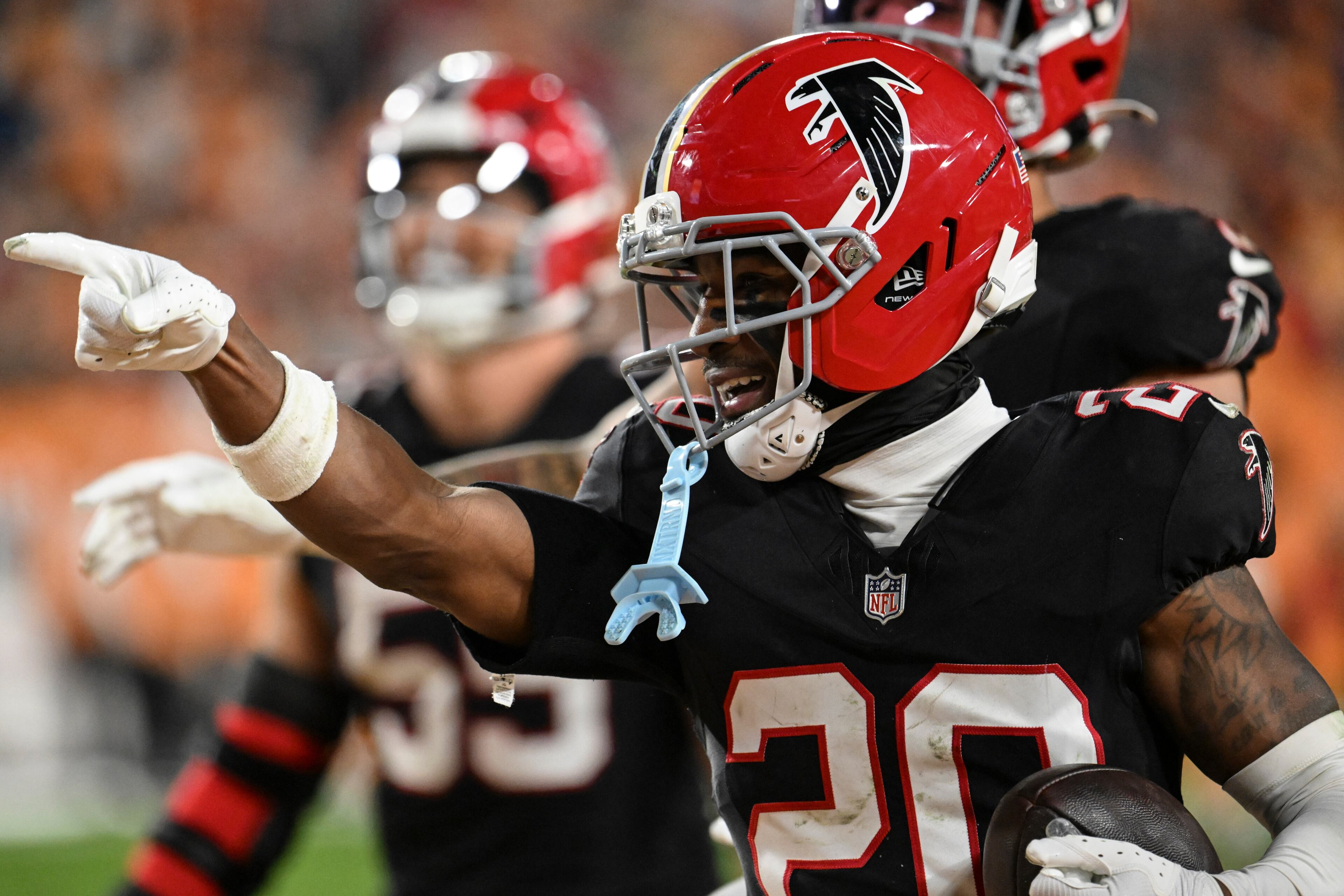 Atlanta Falcons cornerback Dee Alford (20) celebrates his interception against the Tampa Bay Buccaneers during the second half of an NFL football game, Thursday, Dec. 11, 2025, in Tampa, Fla. (AP Photo/Jason Behnken)