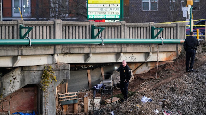 Atlanta police have blocked lanes of Cheshire Bridge Road near Faulkner Road early Wednesday after a fire broke out under the railway overpass.