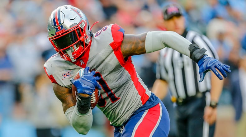 Houston Roughnecks linebacker Edmond Robinson (51) recovers a fumble and runs toward the end zone during the game between the Dallas Renegades and the Houston Roughnecks on March 1, 2020 at Globe Life Park in Arlington. Texas.