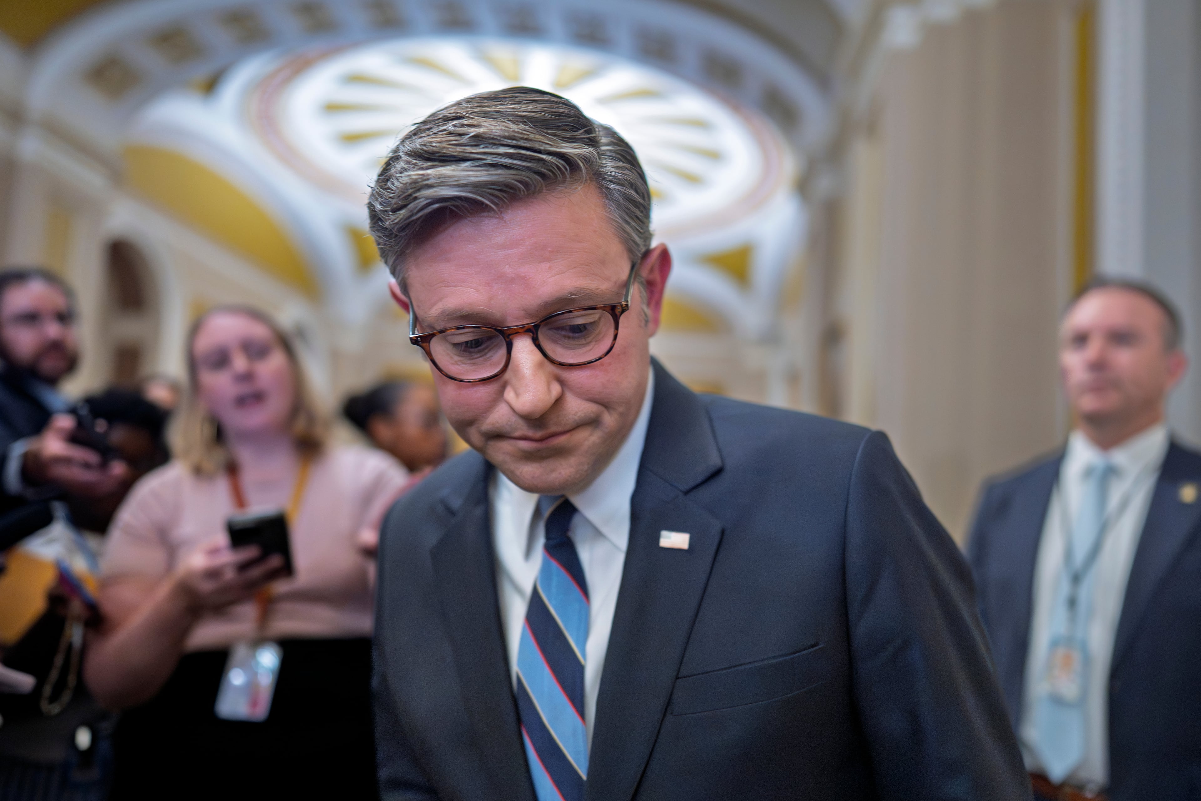 U.S. House Speaker Mike Johnson, R-La., paused after talking to reporters about the government shutdown on Tuesday in Washington.