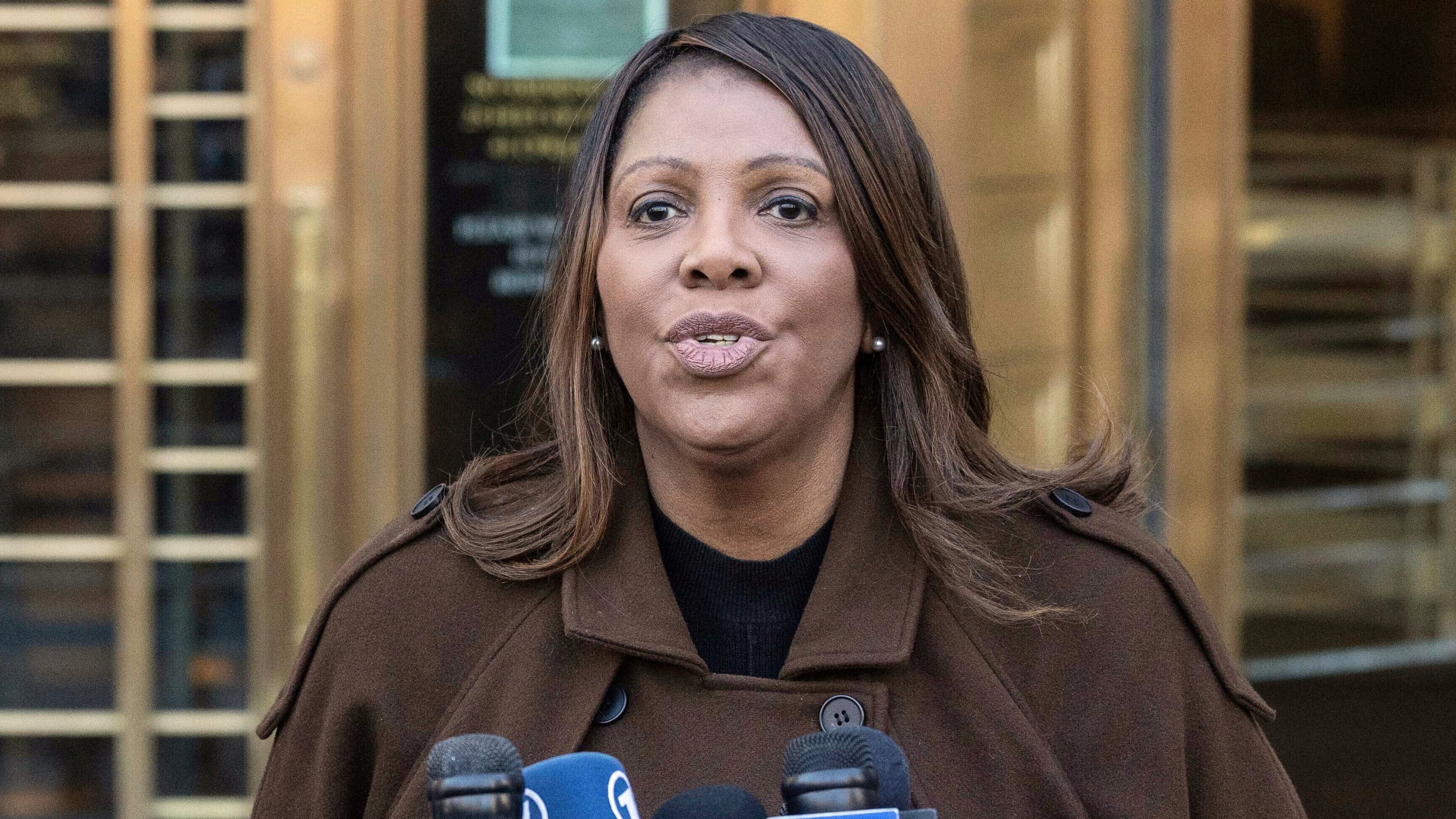 FILE - New York Attorney General Letitia James speaks during a news conference outside Manhattan federal court in New York, Feb. 14, 2025. (AP Photo/Yuki Iwamura, File)