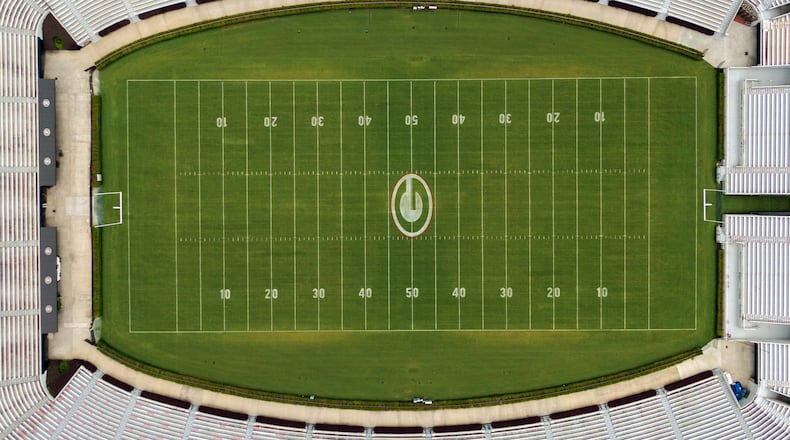 Aerial photo shows Sanford Stadium at the University of Georgia in Athens on Friday, June 11, 2021. With a $25 million expansion completed in 2003 and an additional $8 million in 2004, Sanford Stadium added a second upper deck on the north side and 27 new north side SkySuites bringing the new stadium capacity to 92,746 - the fifth largest on-campus stadium in the country. (Hyosub Shin / Hyosub.Shin@ajc.com)